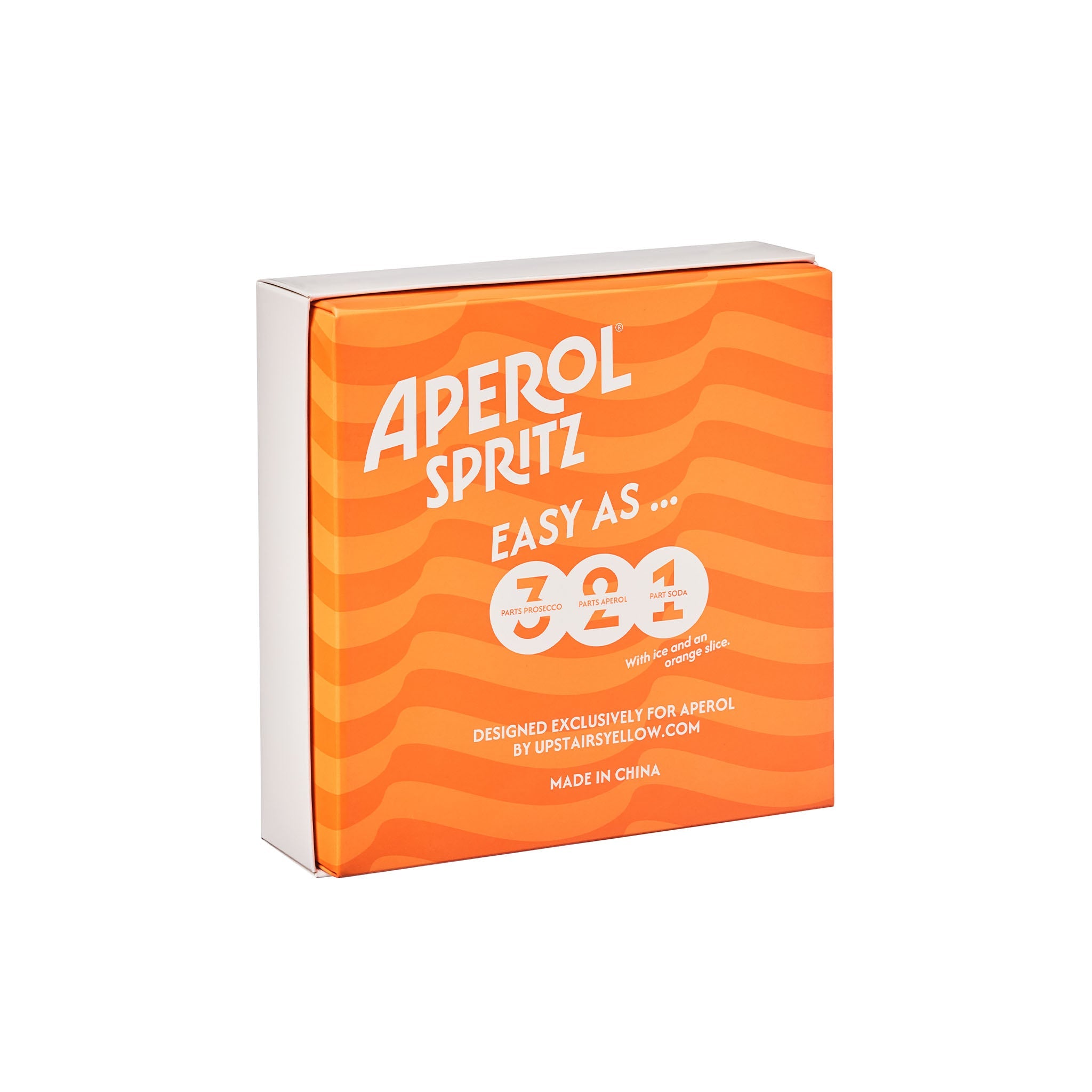 A rectangular box of Aperol Spritz with a bright orange and orange-striped design, featuring the text 'APEROL SPRITZ' and 'EASY AS 321' on a clean white background.