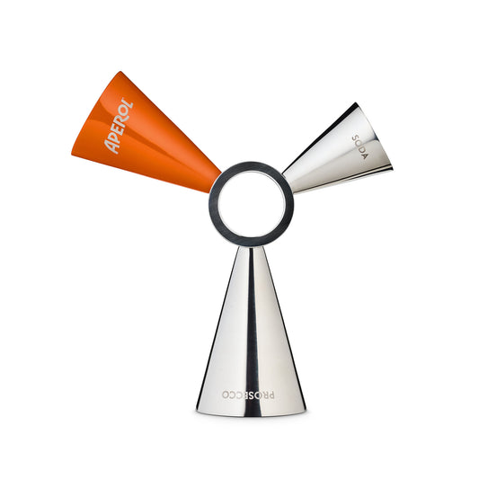 A three-piece jigger by Aperol, featuring a polished silver-tone metal cone for prosecco and a smaller silver cone for soda, with an orange cone for aperol. The pieces are arranged symmetrically around a central black ring on a solid white background.