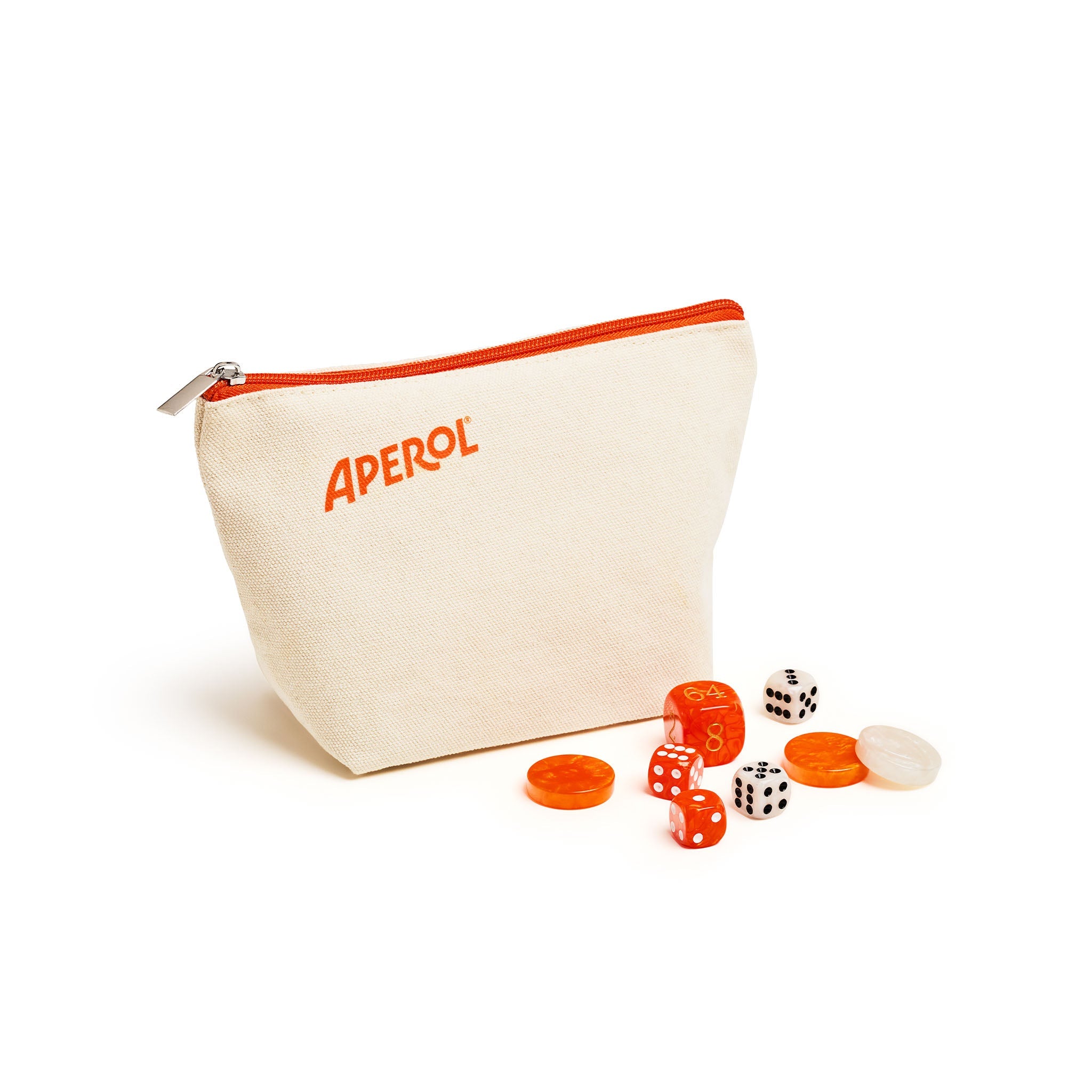 An APEROL canvas zipper pouch in cream with orange trim and orange logo, shown on a white background with several orange and white dice and tokens placed in front.