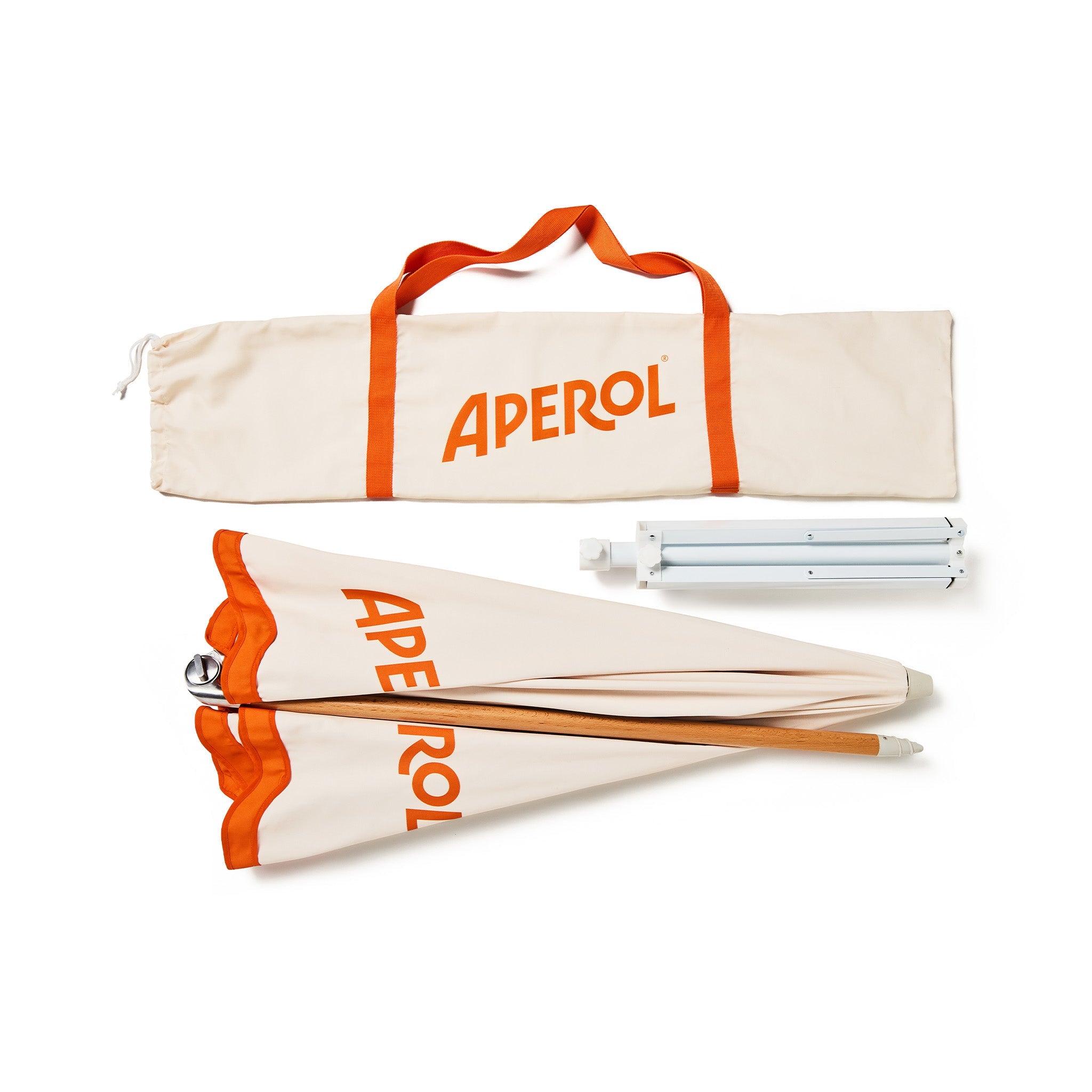 A top view of an APEROL umbrella with its matching canvas carrying bag on a clean white background.